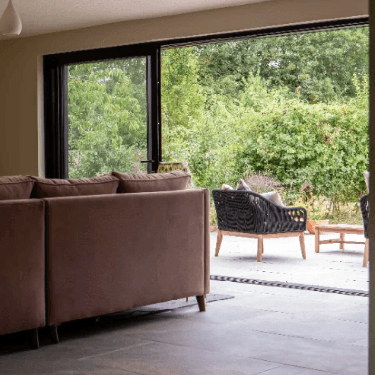 The living room opening onto the back garden
